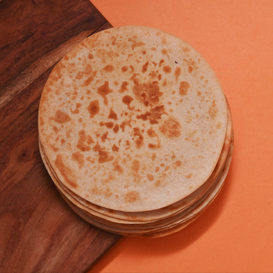 Handmade Kanak Khakhra from Bhairudan and Sons, 400 grams, crispy traditional Indian snack displayed on a plate.